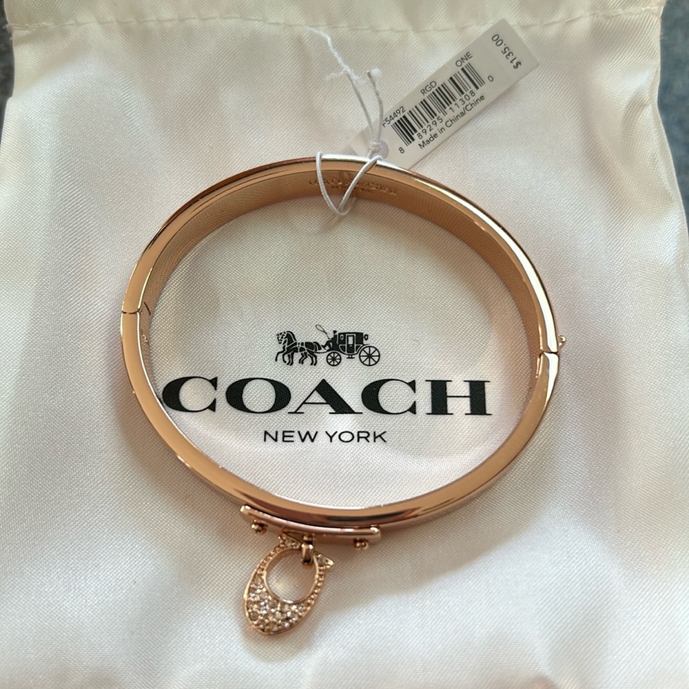 Coach signature C hinged rose gold bangle bracelet
